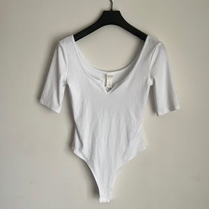 White half sleeve body suit